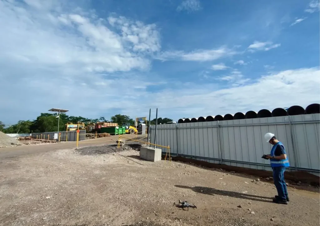 Operva.AI’s drone pilot preparing for takeoff at a customer’s construction site.